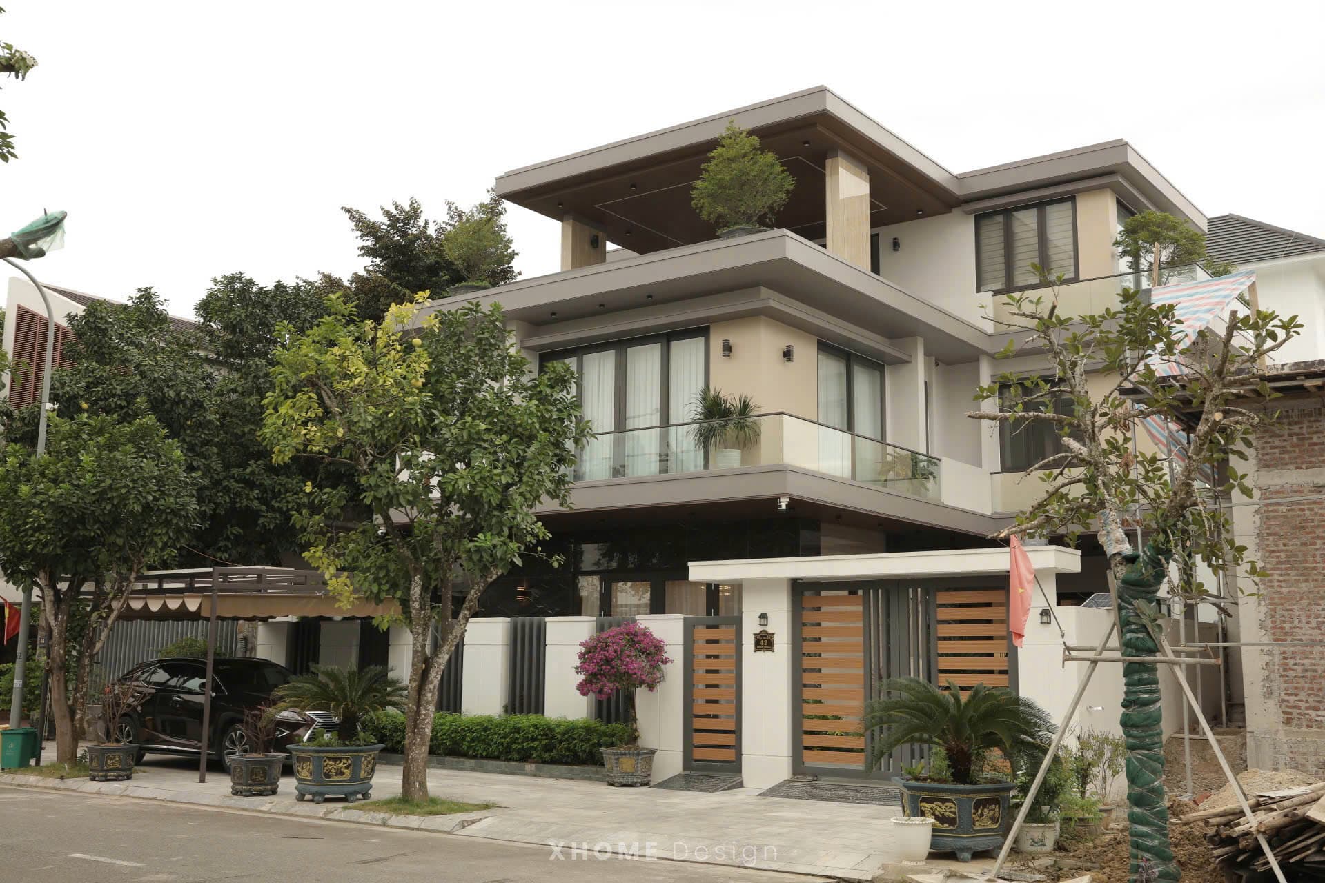 Xây dựng biệt thự trọn gói 3 tầng nội thất gỗ óc chó Hue Villa